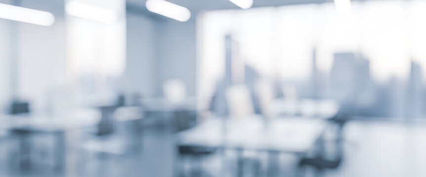 Bright abstract office interior with blurred modern furniture and city view, enhanced with soft ambient lighting and subtle reflections that emphasize a clean and contemporary workspace atmosphere.