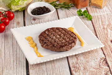 Grilled juicy beef cutlet for burger