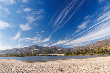 Ocean coast in Malibu on a beautiful summer day with scenic blue sky