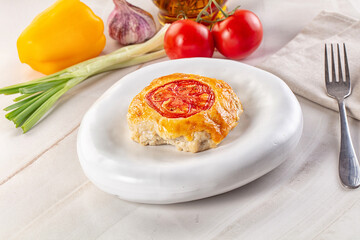 Chicken chop cutlet with cheese and tomato