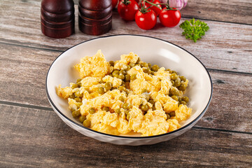 Scrambled egg omelet with green peas