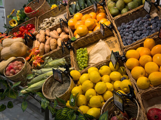 Vibrant assortment of fruits and vegetables showcased in baskets at a bustling market