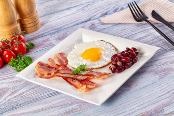 English breakfast with egg, bean and bacon