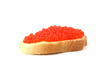 a sandwich with red caviar on a white background