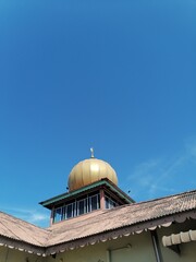 roof of mosque and blue sky 