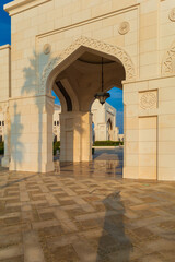 Elements of architecture of buildings, ancient arches, columns, windows and apertures. On the streets in Emirates, public places.