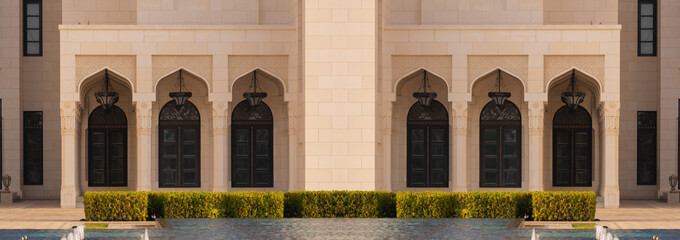 Elements of architecture of buildings, ancient arches, columns, windows and apertures. On the streets in Emirates, public places.