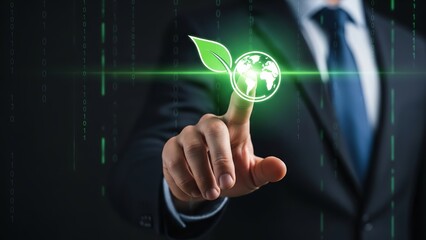 Businessman touching futuristic hologram of green earth and leaf icon