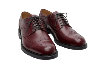 Burgundy leather wingtip dress shoes isolated PNG, classic men s footwear for formal occasions and professional attire on transparent