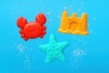 Colorful beach toys crab starfish sandcastle enjoying a playful dip in water