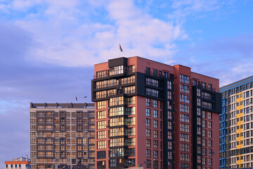 The sun is reflected in the building. Sunlight and beautiful cityscape, modern buildings and city streets, public place
