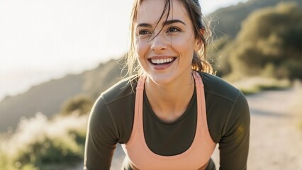 Happy smiling woman taking break from running outdoors. Active young female athlete exercising on nature trail. Healthy fitness and wellness lifestyle