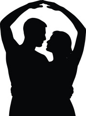 Silhouette of a couple embracing forming a heart shape with their arms