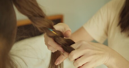 Young learners demonstrate diverse and intricate braiding skills publicly