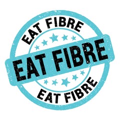 EAT FIBRE text written on blue-black round stamp sign.