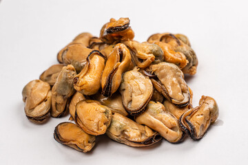 Pickled Mussels in Plastic Container on Dark Background