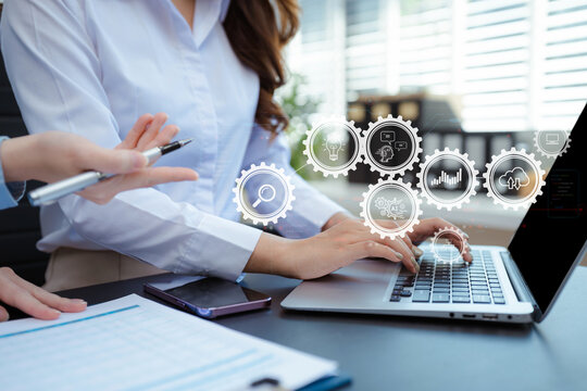 Business woman working and studying together with tablet document graph paper in office, discuss finance and marketing solution reporting file in working place.