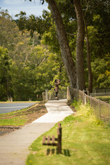 Scenic view of woman photographing on footpath of small town, Timboon, Victoria, Australia