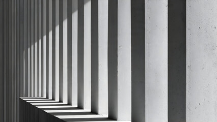 A geometric study of a concrete facade with precisely aligned vertical pipes producing crisp tonal contrasts