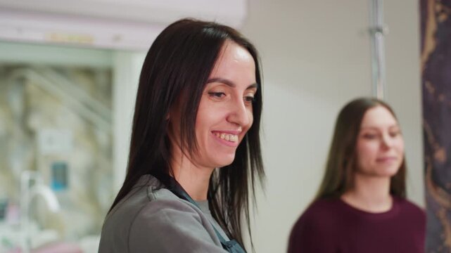 beauty professional showcases modern look to pleased customer in mirror, friendly stylist presents recent hairstyle transformation to delighted client amidst welcoming salon environment