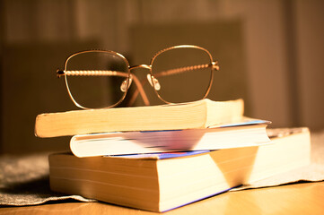 glasses on a book, learning and business © Mariusz