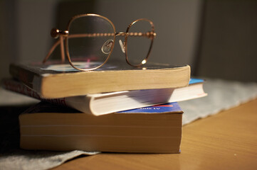 glasses on a book, learning and business © Mariusz