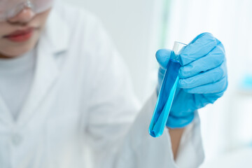 Scientist analyze biochemical sample in advanced scientific laboratory. Medical professional check...