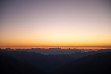 Watching the sunrise from the Kaçkar Mountains. Sunrise from Kaçkar Peak. Hiking towards Kaçkar Peak in the early morning. Magnificent view from Kaçkar Peak. Rize, Türkiye.
