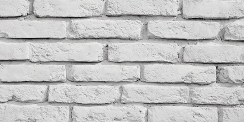 White brick wall with a few bricks missing