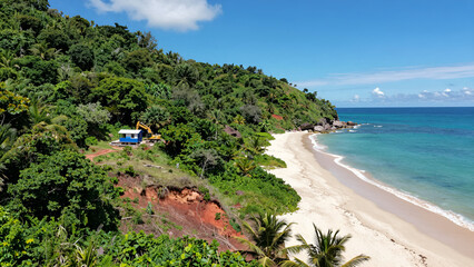 Obraz premium Coastal Hillside Construction Site Aerial View