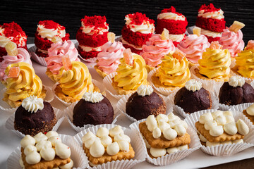 A tasty variety of colorful pastries and desserts awaits eager customers
