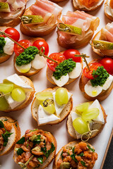 A vibrant selection of gourmet canapés arranged beautifully, perfect for a lively gathering