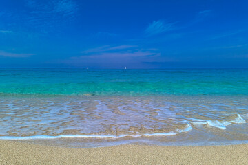 Famous beach on west part of Lefkada (Levkas) island, Ionian sea, Greece. A small boat on the open sea