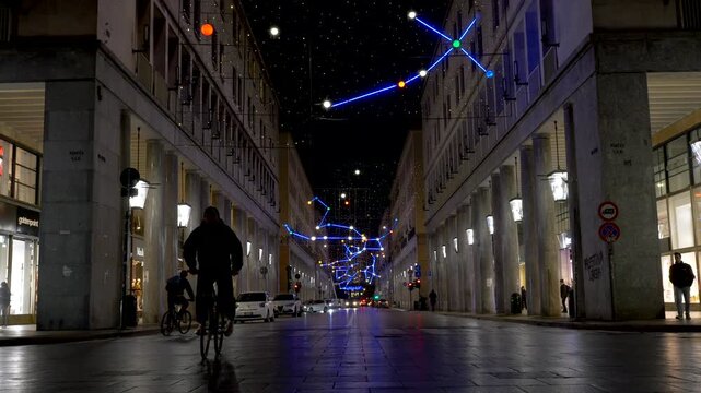 Italy, Turin, 11-11-2024. Via Roma illuminated at night. City of Turin. Slow motion 4K