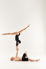 Dynamic acrobatics showcase with vivid poses in a minimalist studio setting