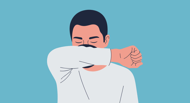A man demonstrates proper cough and sneeze etiquette by covering his mouth with his elbow, promoting good hygiene and health.