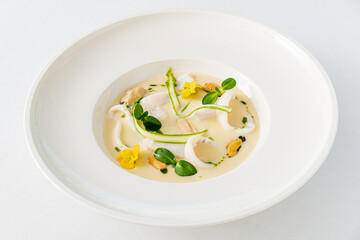 An elegantly arranged seafood dish highlights fresh ingredients and vibrant flavors