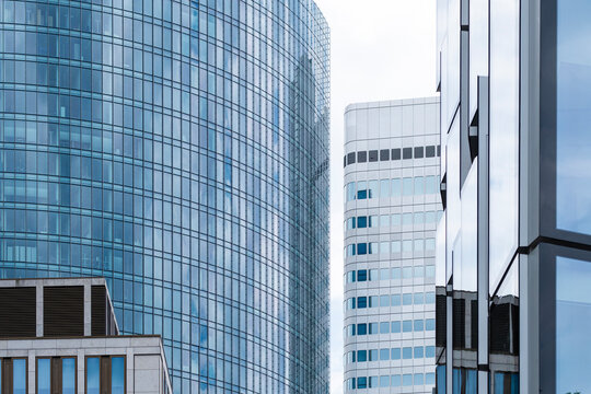 Modern corporate architecture framing a dominant skyscraper in Frankfurt&rsquo;s finance district, projecting stability, growth and future aspirations in the evolving skyline