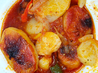 Egyptian Potato Bakes or Stews with tomato sauce
