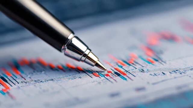 Analysis of financial data trends using a pen to highlight important points on a report sheet in a business setting - Powered by Adobe