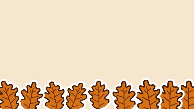 A horizontal band of autumn leaves forms a decorative border, adding a warm harvest feeling and enhancing the inviting seasonal tone associated with Thanksgiving