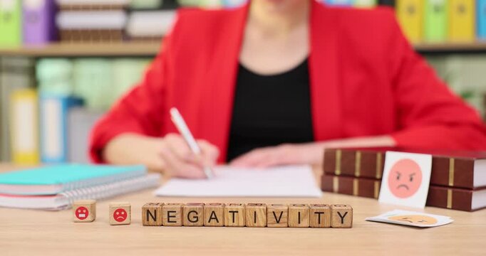 Exploring the impact of negativity through creative expression and thoughtful reflection in a colorful workspace