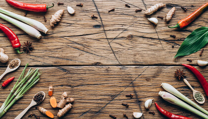 Rustic culinary scene featuring vibrant spices and herbs arranged on weathered wooden planks, perfect for food blogging and recipe designs, inviting spice aroma