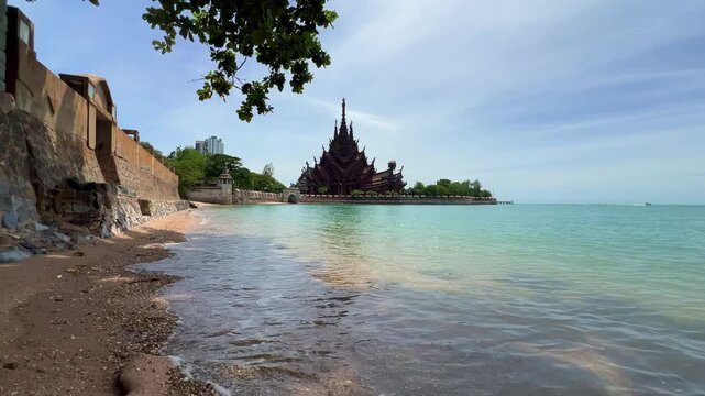 Pattaya, Thailand, June 7, 2022: The Temple of Truth (Prasat Sut Jatum), a beautiful wooden Buddhist temple by the sea. The Temple of Truth in Pattaya. A giant wooden structure located on Naklua Cape.