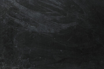 Empty school chalk board on a wooden table. Empty space to enter text or insert graphics. Concept in education or business.