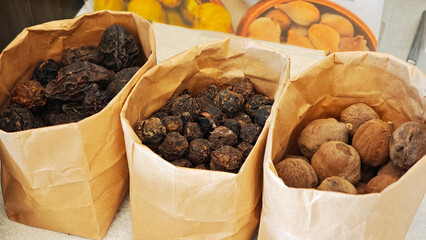 Dried herbal medicine in paper bags
