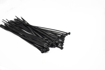 Bunch of Black Cable Ties Isolated on White Background