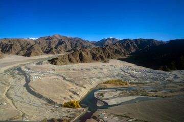 Aerial landscape view of Ladakh valley near Kushok Bakula Rimpochee Airport, India