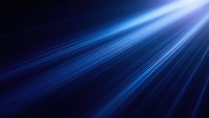 Fototapeta premium Bright blue light beams create stunning visual effect, radiating in dark background, evoking sense of depth and motion