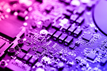 Chip of laptop. Open notebook ready to repair. Neon tone image